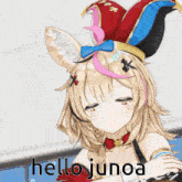 a cartoon girl with a jester hat and the words hello junoa below her