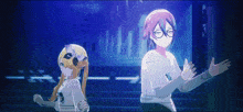 a couple of anime girls are standing next to each other in a dark room .