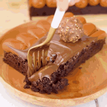 a piece of brownie with a fork sticking out of it
