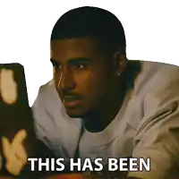 a man sitting in front of a laptop with the words " this has been " written below him