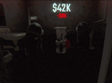 a sign that says $ 42k - $ 8k on it