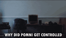 a computer monitor sits on a desk with the words why did pomni get controlled above it