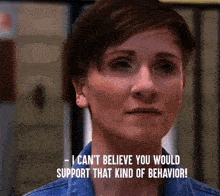 a woman in a denim jacket says i can 't believe you would support that kind of behavior !