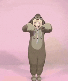 a girl in a dog costume is pointing her fingers