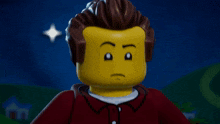 a group of lego figures including a man in a red jacket