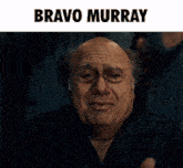a bald man is making a funny face with the words bravo murray above him