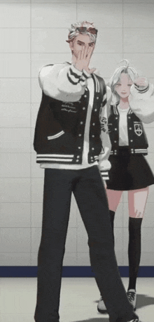 a man in a black and white varsity jacket stands next to a girl in a black skirt