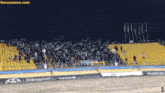a soccer stadium with a banner that says dobrykowski