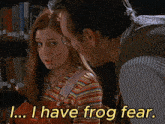 a man and a woman in a library with the words i have frog fear on the bottom