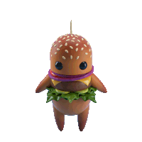 a figurine of a hamburger with a toothpick on top