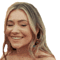 a close up of a woman 's face with her eyes closed smiling