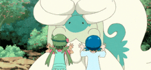 a couple of girls are standing next to each other looking at a cartoon character .