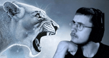 a man wearing headphones is looking at a drawing of a lion .