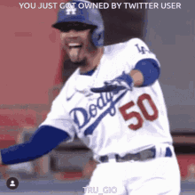 a dodgers baseball player with the number 50 on his uniform