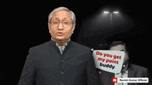a man in a suit is holding a speech bubble that says do you get my point buddy