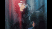 a girl in a black dress is standing next to a boy