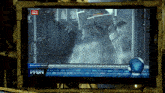 a tv screen shows a breaking news story