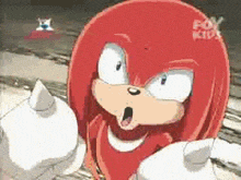 knuckles the echidna from sonic the hedgehog giving a thumbs up sign
