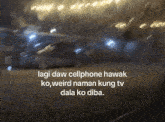 a blurry picture of a street with the words lagi daw cellphone hawak ko , weird naman kung tv dala ko diba .