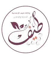 a purple and white logo with arabic writing