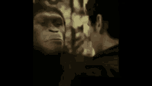 a close up of a person 's face in a dark room with a window in the background .