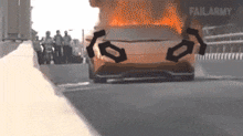 a car that is on fire and has failarmy written on the bottom