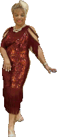 a woman in a red sequined dress with fringe is smiling