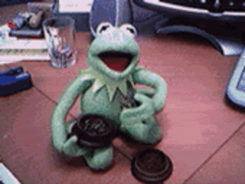 kermit the frog smoking a cigarette