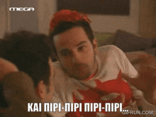 a man with red hair is talking to another man with the words kai npi-npi npi-npi