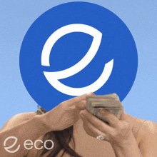 a woman is holding a stack of money in front of a blue e logo