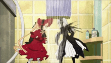 a girl in a red dress stands next to a girl in a black and white dress