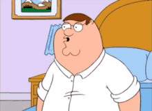 a cartoon character named peter griffin is sitting on a bed