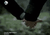 a couple holding hands with the words oyle bir geçer zaman ki yeni bolum below them