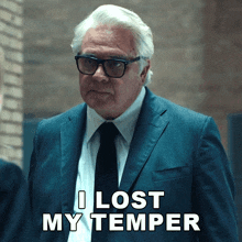 a man in a suit and tie has the words " i lost my temper " below him