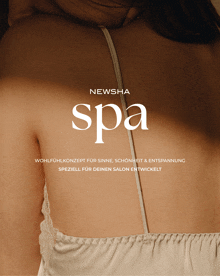a woman 's back is shown with the word spa on it