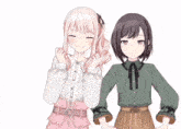 two anime girls are standing next to each other one is smiling and the other is sad