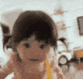 a baby in a diaper is eating a banana and making a funny face .