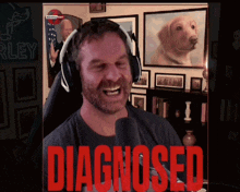 a man wearing headphones with the word diagnosed on the bottom