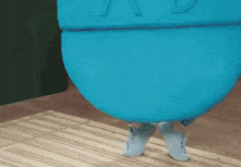 a person wearing a blue costume with the letter v on it