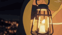 a cartoon of a person holding a lantern with a lit candle on it