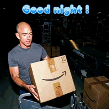 a man is carrying a cardboard box that says e-mail on it