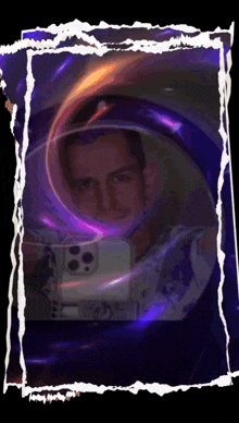a man is taking a picture of himself in a purple frame