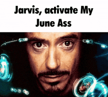 a close up of a man 's face with the words jarvis activate my june ass above him