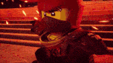 a lego ninjago character is wearing a red helmet and holding a fireball .