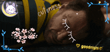a man laying on the ground with the words cuteness and goodnight