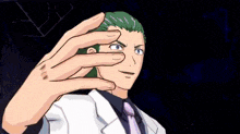 a man with green hair is making a hand gesture with his fingers