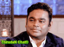 a picture of a man with the words thirudan chat on the bottom