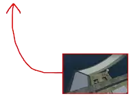a red arrow pointing up to a picture of a landscape