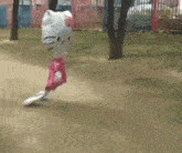 a person in a hello kitty costume is running on a skateboard
