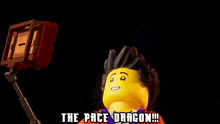 a lego character says " the pace dragon " in front of a bat